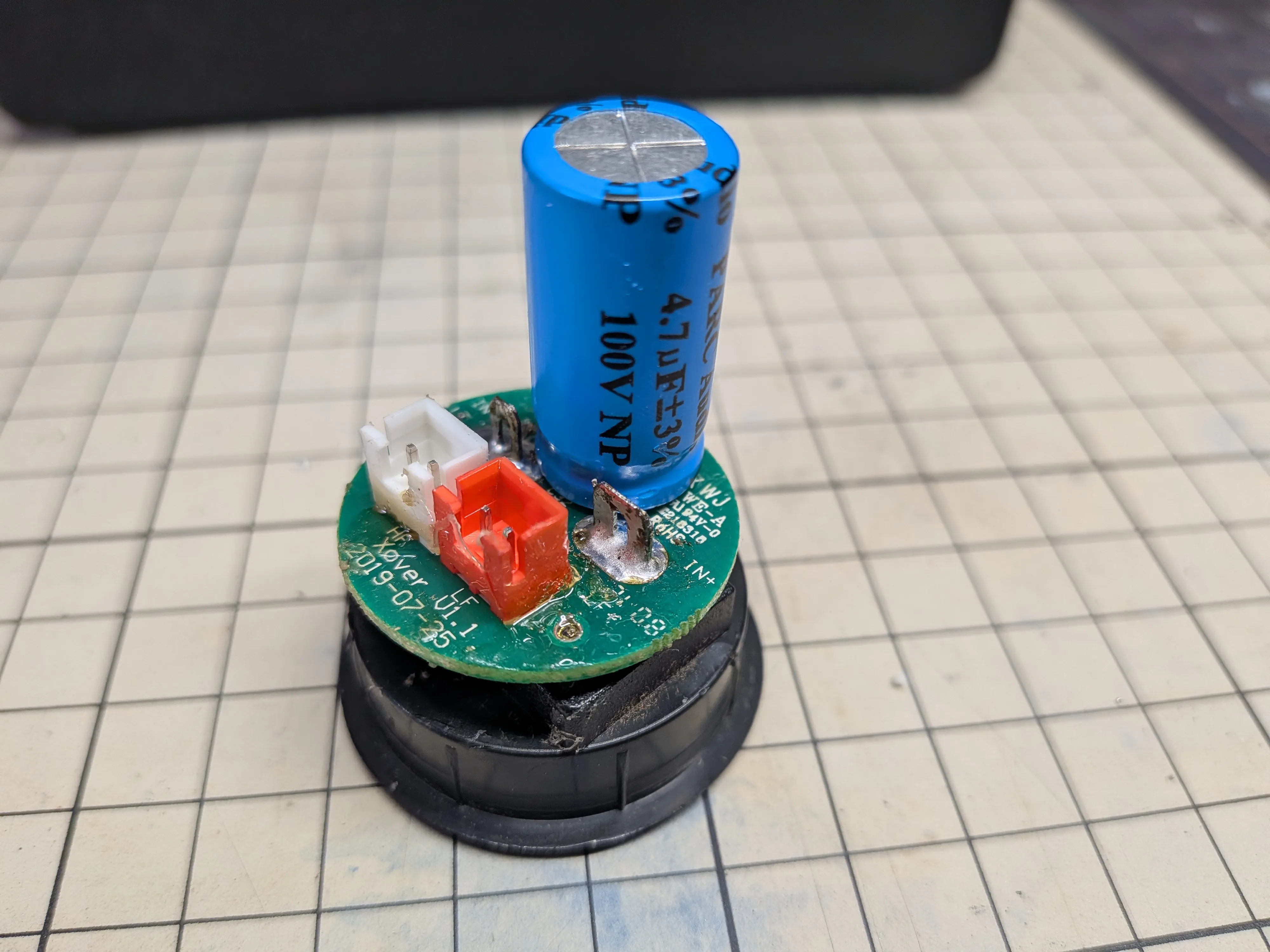 Close-up of replaced capacitors on the PCB